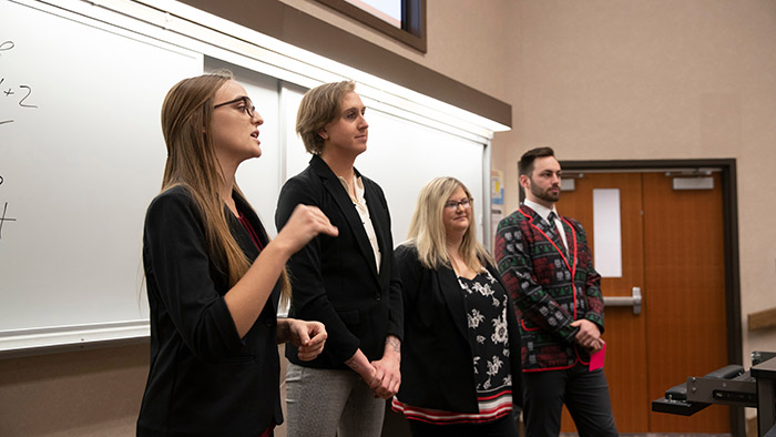 Health professions administrative leadership student making presentation